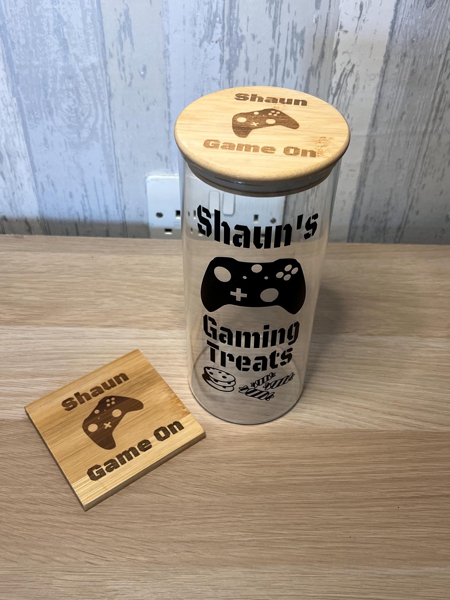 Personalised gaming jar /streaming treat jar. Engraved lid and choice of engraved coaster slate or wooden . Great gift for the gamer-console
