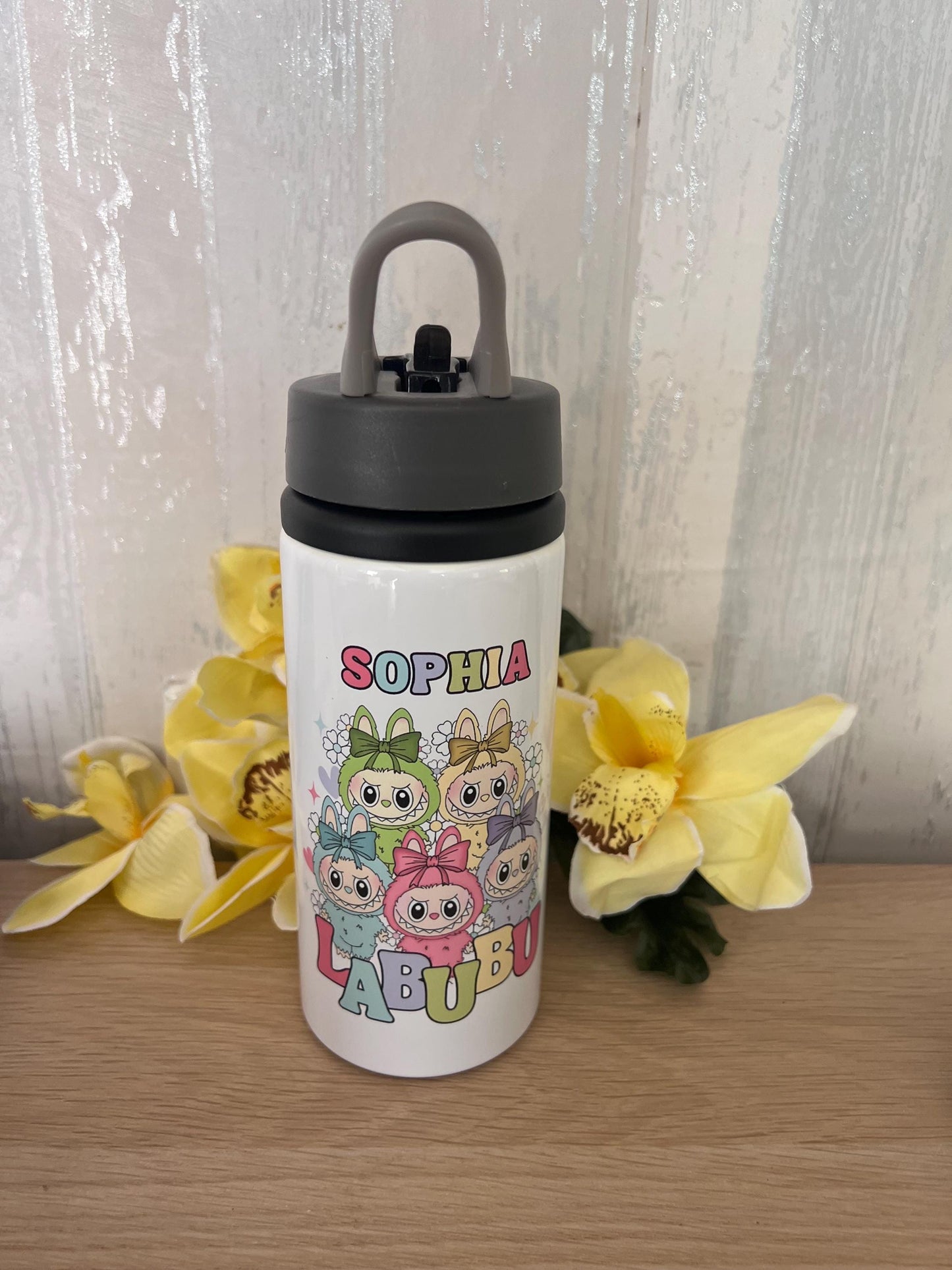 Labubu inspired mug. labubu cup personalised with name. printed both sides 10oz mug. Childs cup now with matching aluminium water bottle.