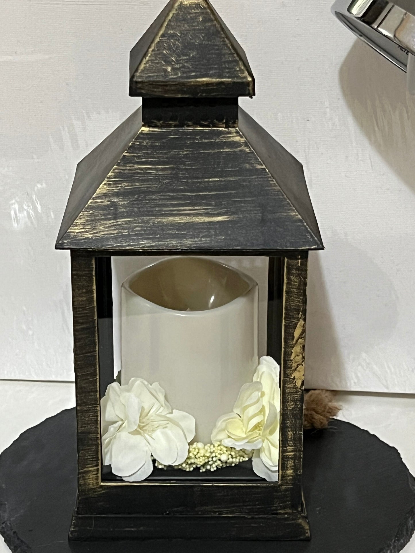 Floral Lantern Black with brushed gold for garden or home.