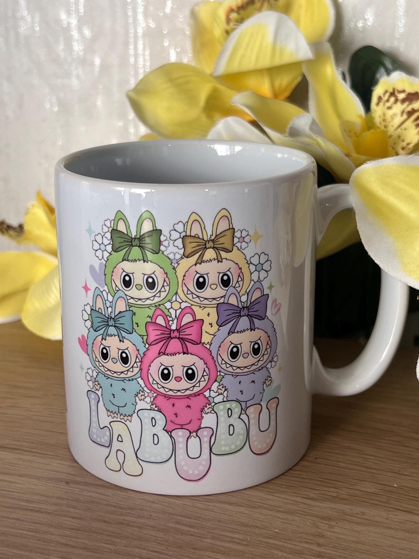 Labubu inspired mug. labubu cup personalised with name. printed both sides 10oz mug. Childs cup now with matching aluminium water bottle.