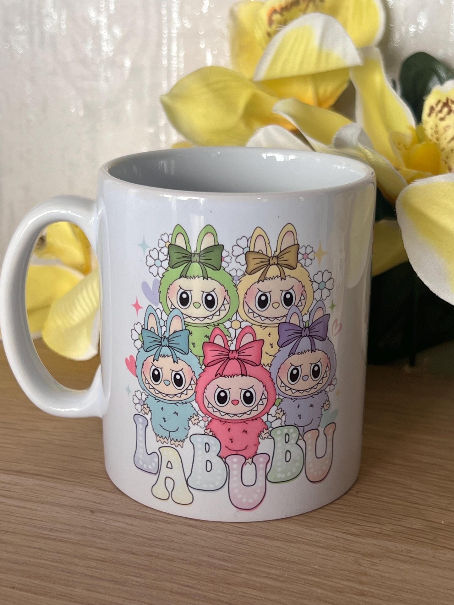 Labubu inspired mug. labubu cup personalised with name. printed both sides 10oz mug. Childs cup now with matching aluminium water bottle.