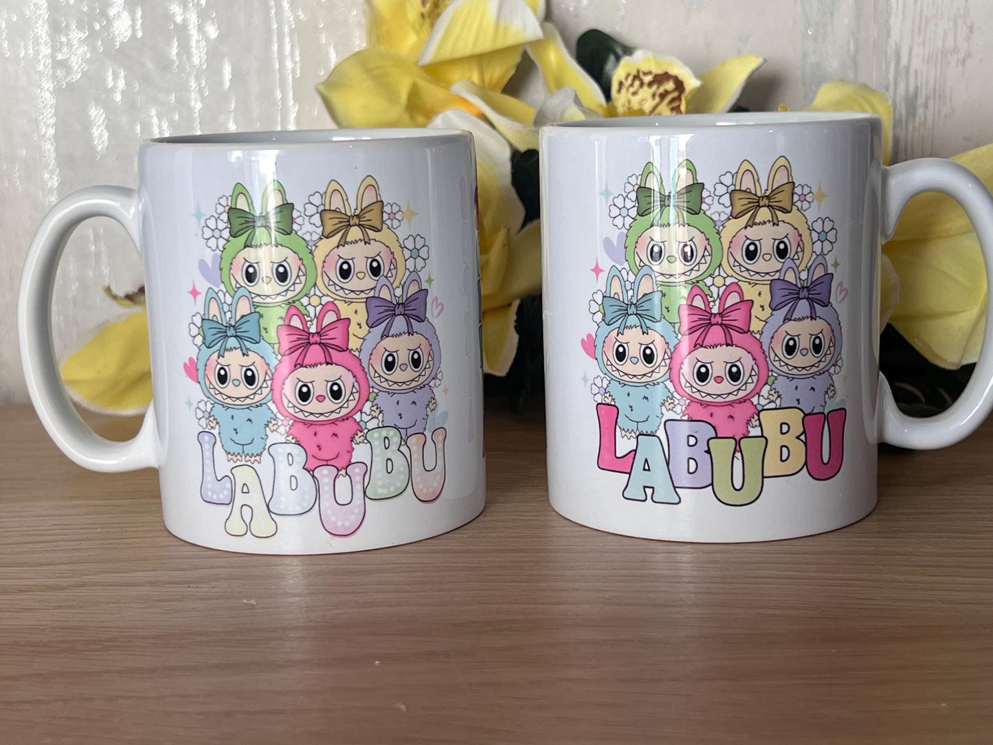 Labubu inspired mug. labubu cup personalised with name. printed both sides 10oz mug. Childs cup now with matching aluminium water bottle.