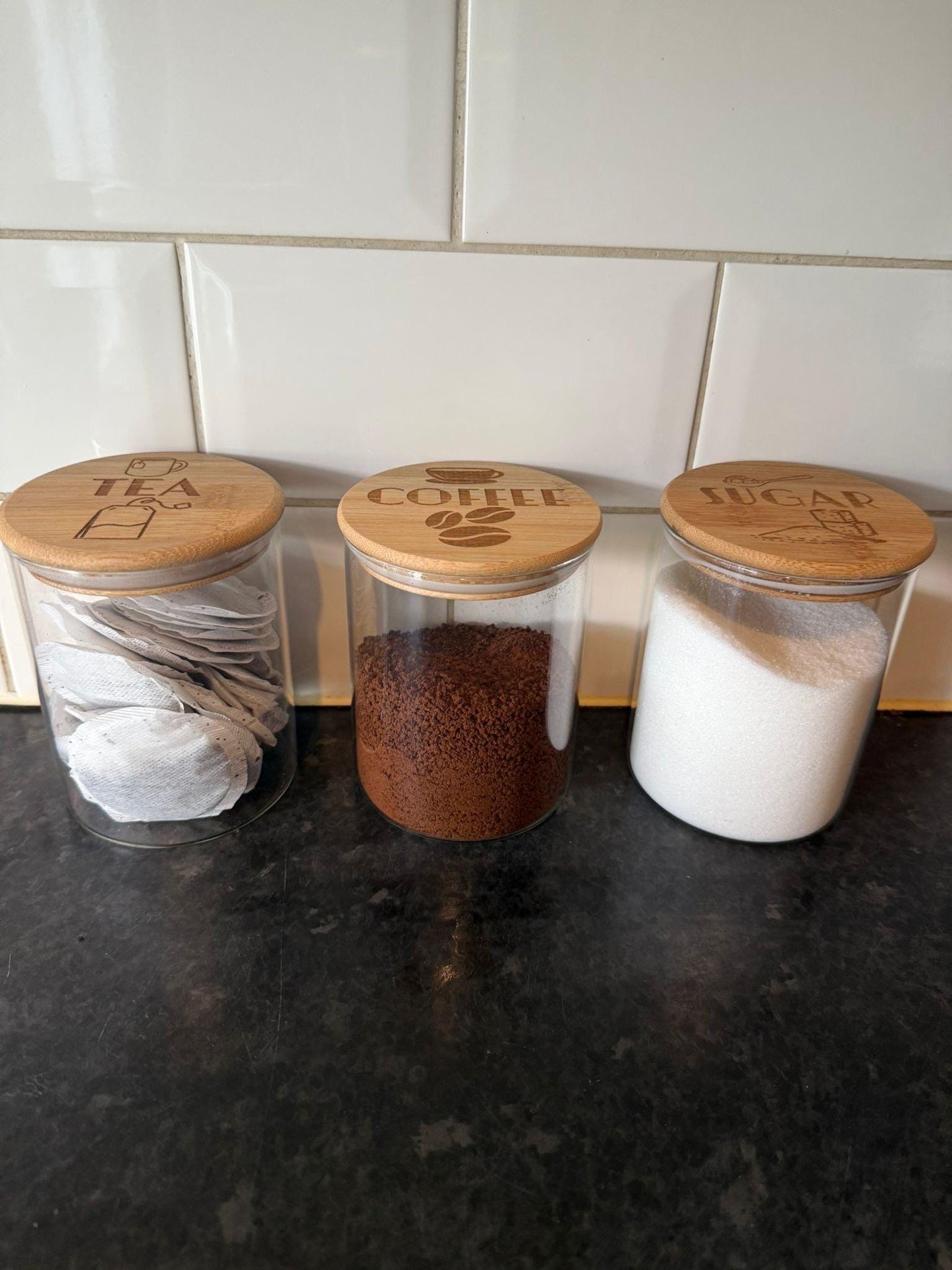 Engraved Tea Coffee and Sugar canister set or individual. Glass storage with engraved airtight bamboo lid. visual aid