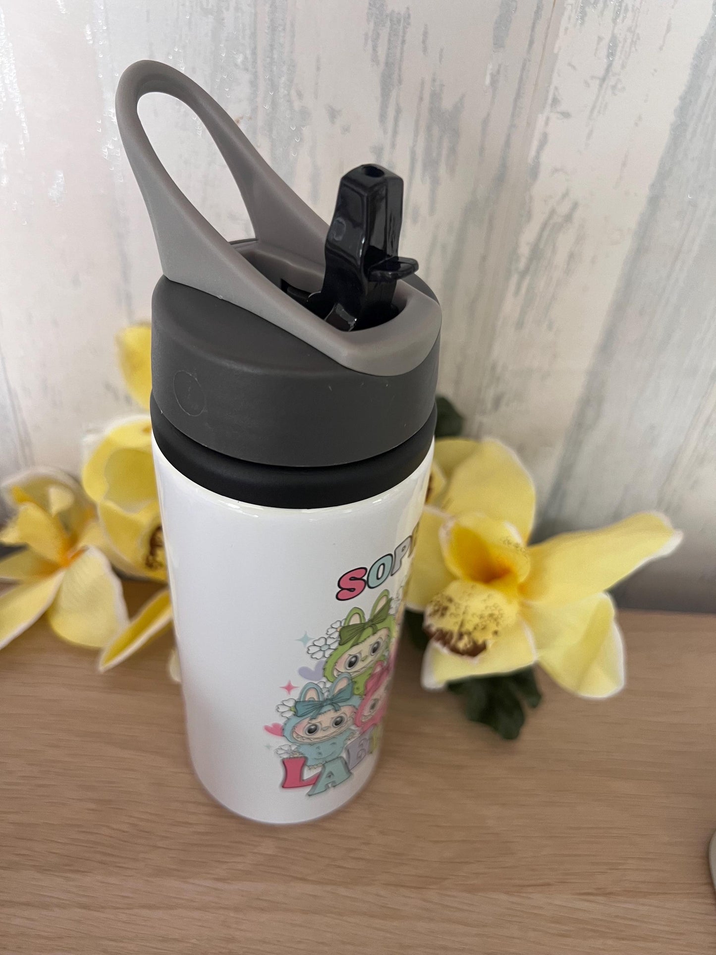 Labubu inspired mug. labubu cup personalised with name. printed both sides 10oz mug. Childs cup now with matching aluminium water bottle.