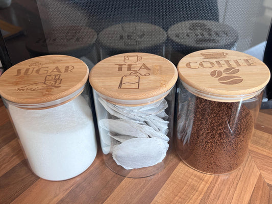 Engraved Tea Coffee and Sugar canister set or individual. Glass storage with engraved airtight bamboo lid. visual aid