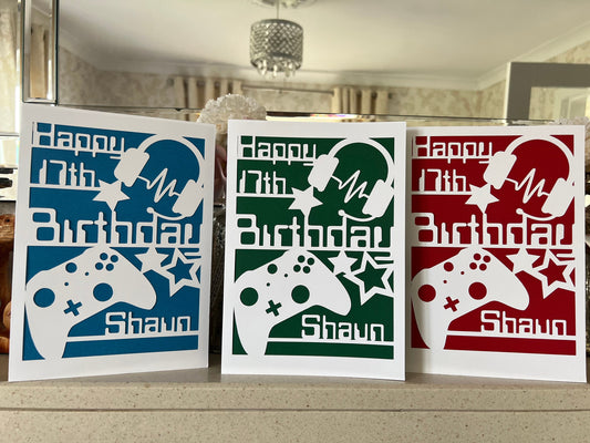 Personalised gaming birthday card. A5 name and age. Headset and controller choice of colour backing.