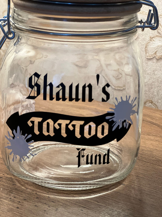 Personalised Tattoo glass money jar. Savings jar. 2 sizes ….Money jar, coins and notes.